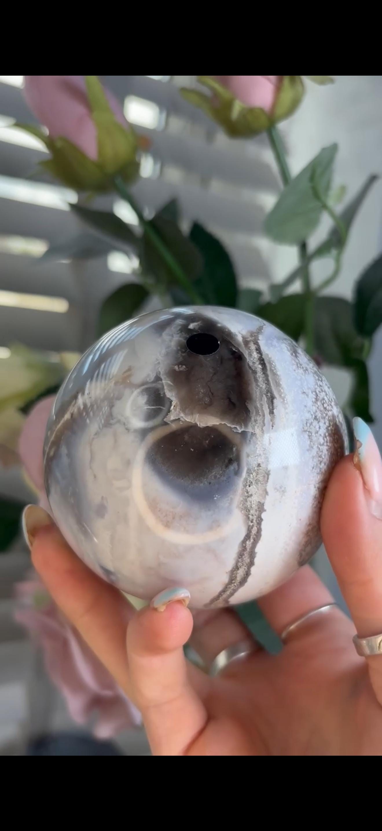 Pastel ocean jasper sphere in baby blue, white & dark blue tones with quartz