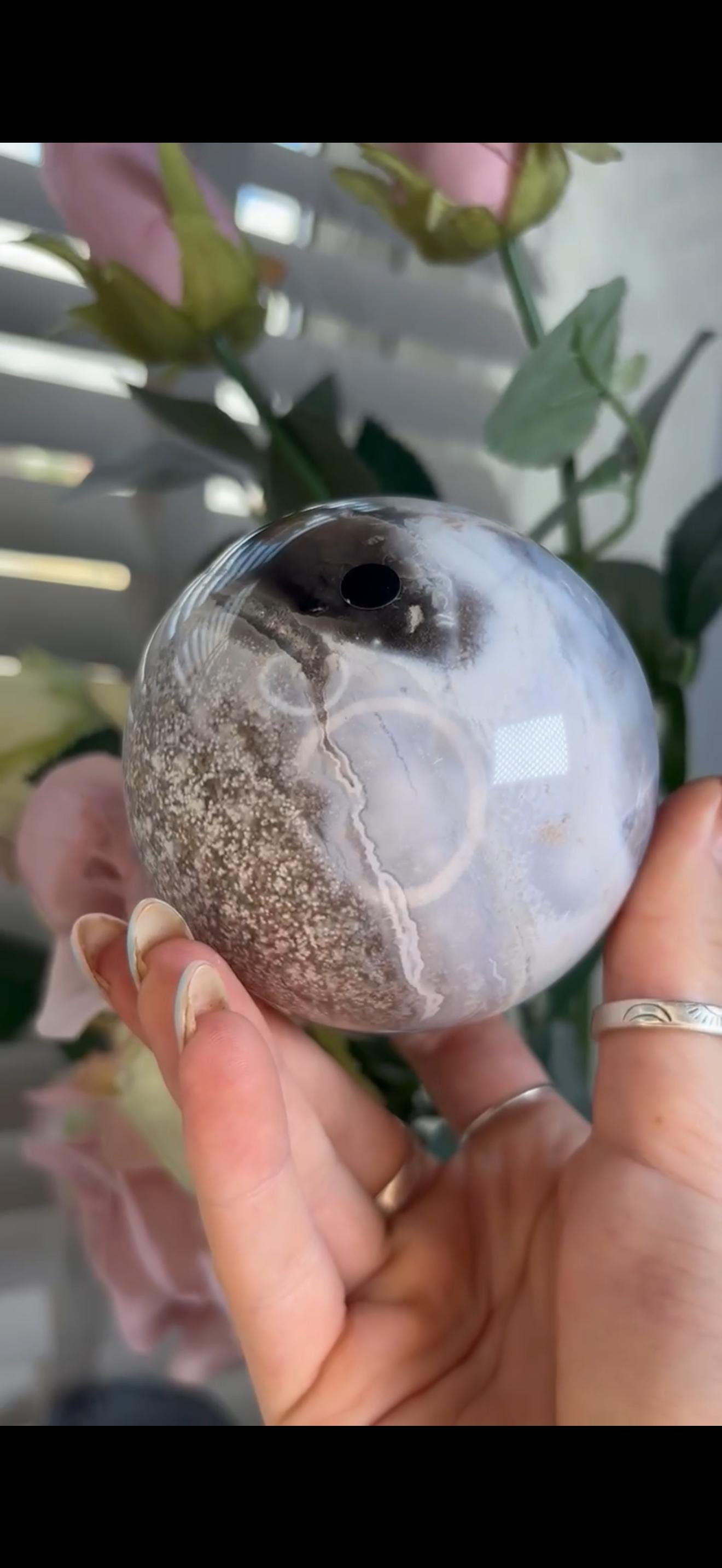 Pastel ocean jasper sphere in baby blue, white & dark blue tones with quartz
