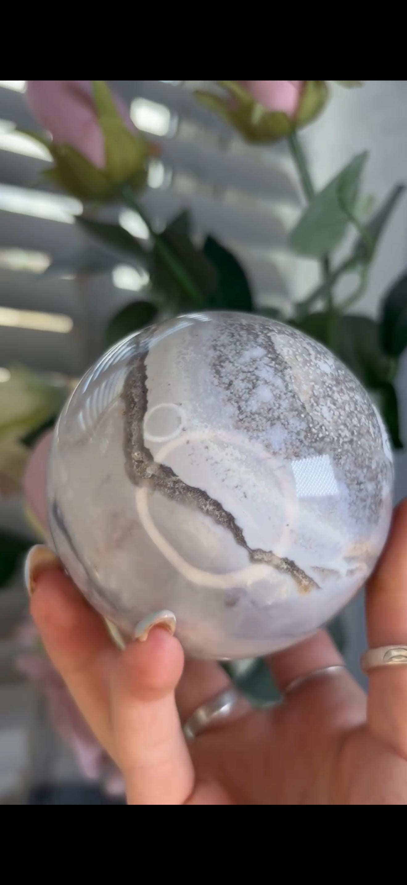 Pastel ocean jasper sphere in baby blue, white & dark blue tones with quartz