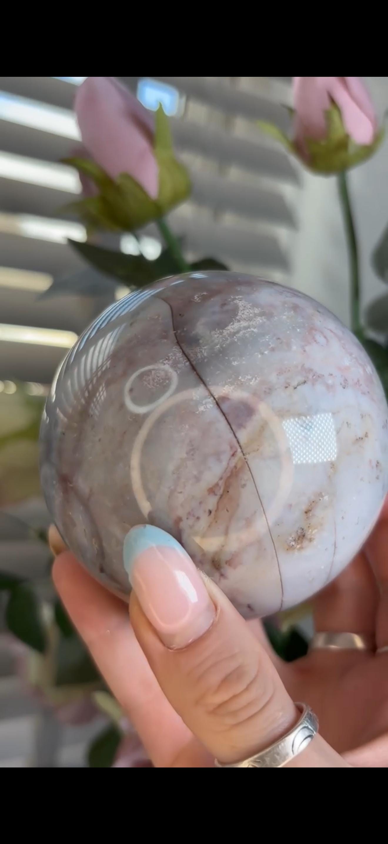 Pastel ocean jasper sphere in blue, pink & grey tones with some rough