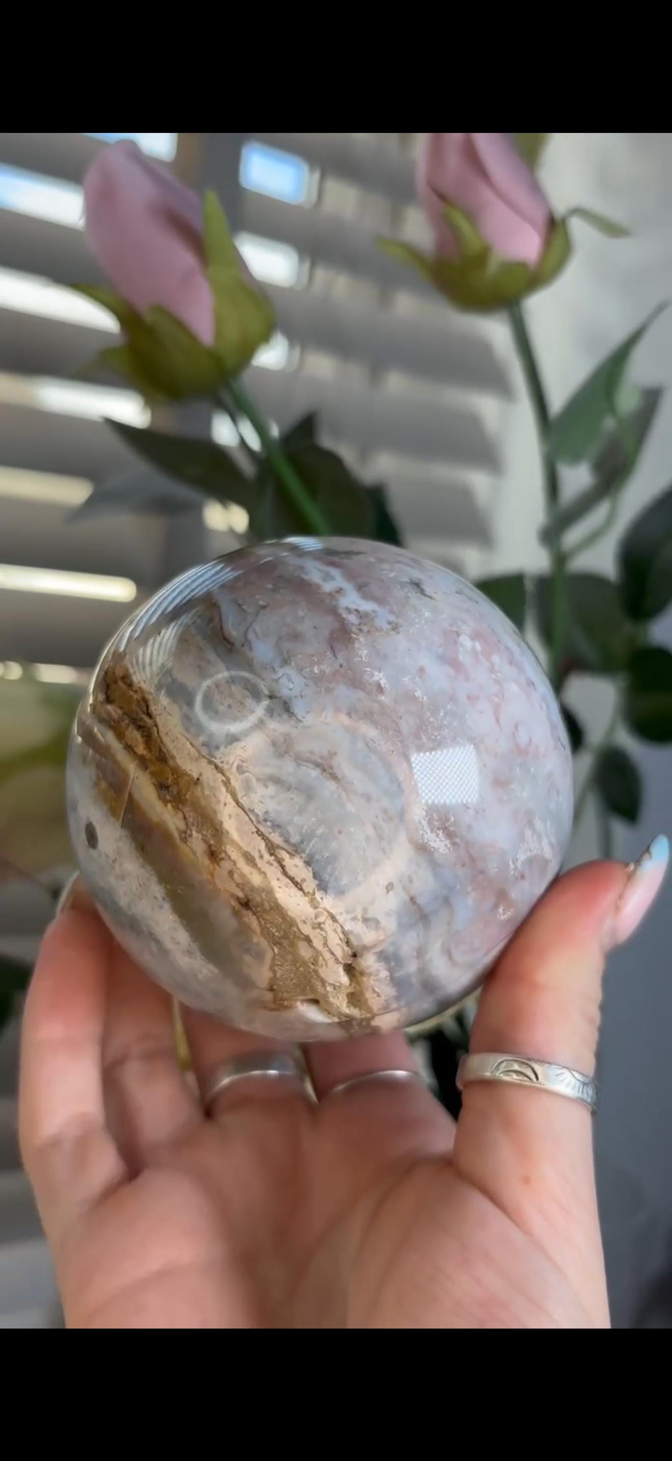 Pastel ocean jasper sphere in blue, pink & grey tones with some rough