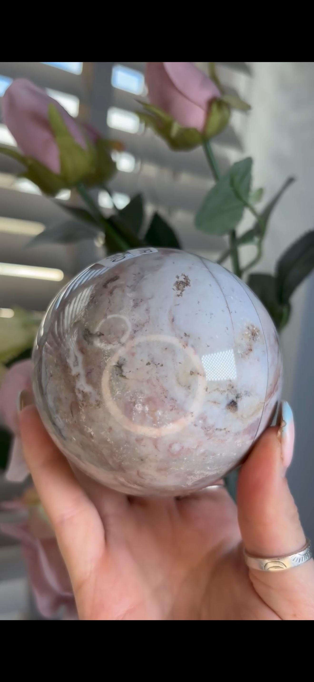 Pastel ocean jasper sphere in blue, pink & grey tones with some rough