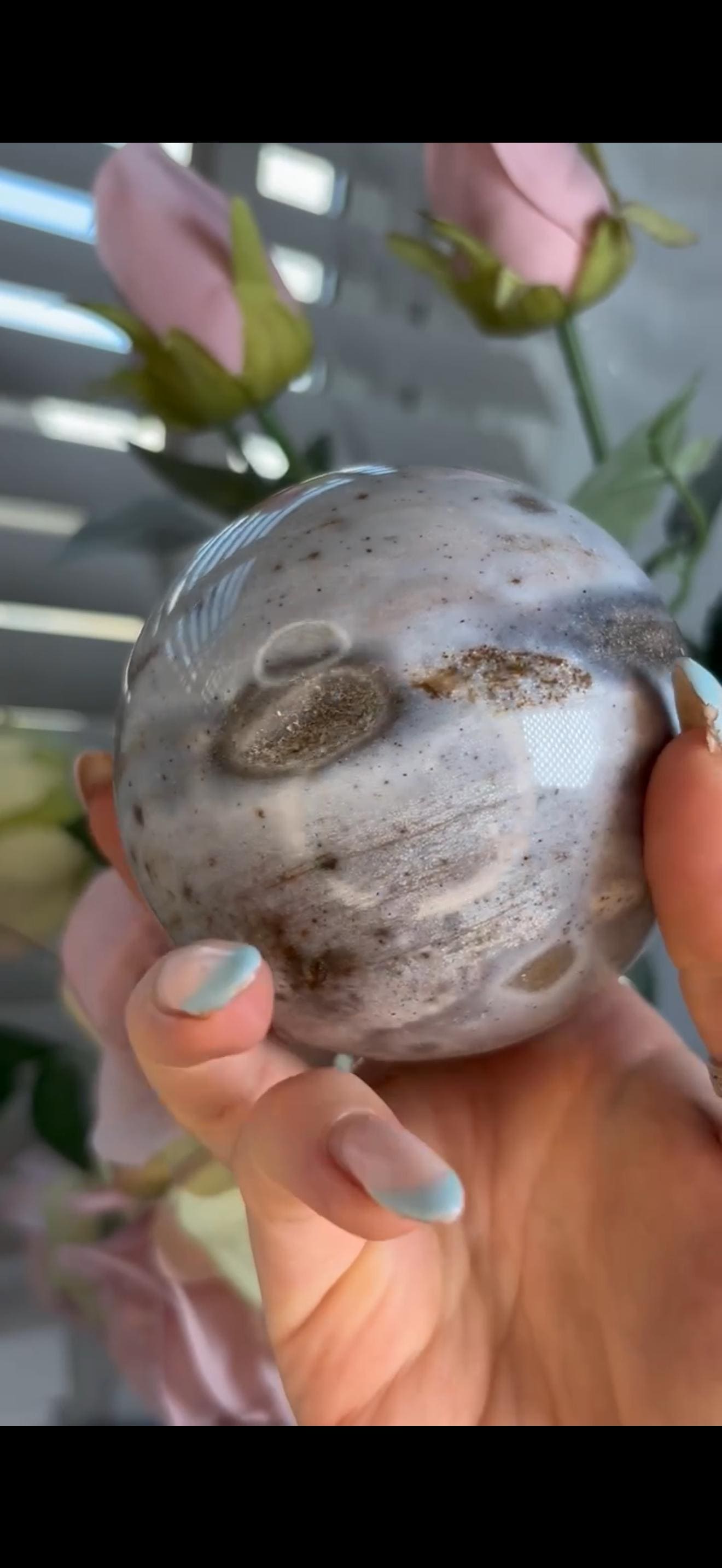 Pastel ocean jasper sphere in baby blue & grey tones with some druzy