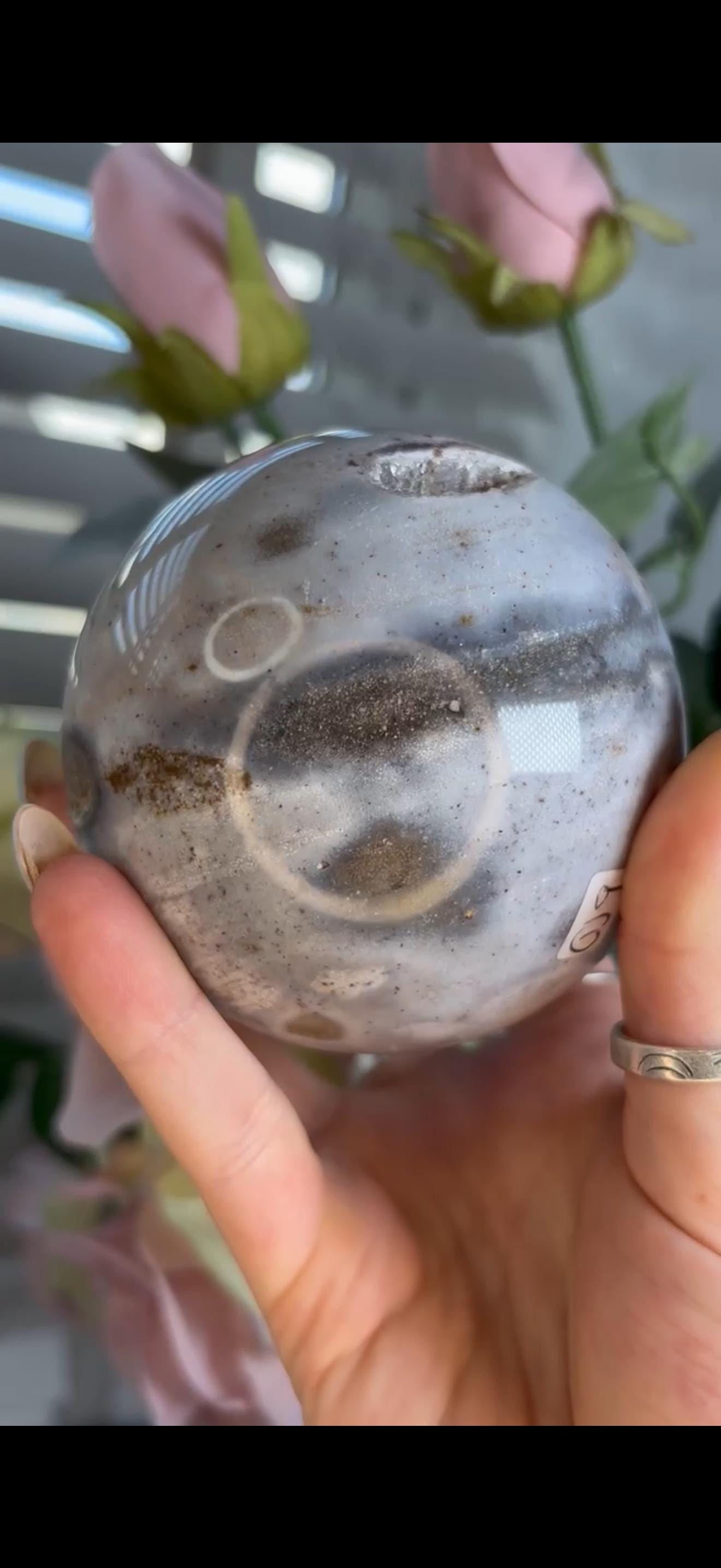 Pastel ocean jasper sphere in baby blue & grey tones with some druzy
