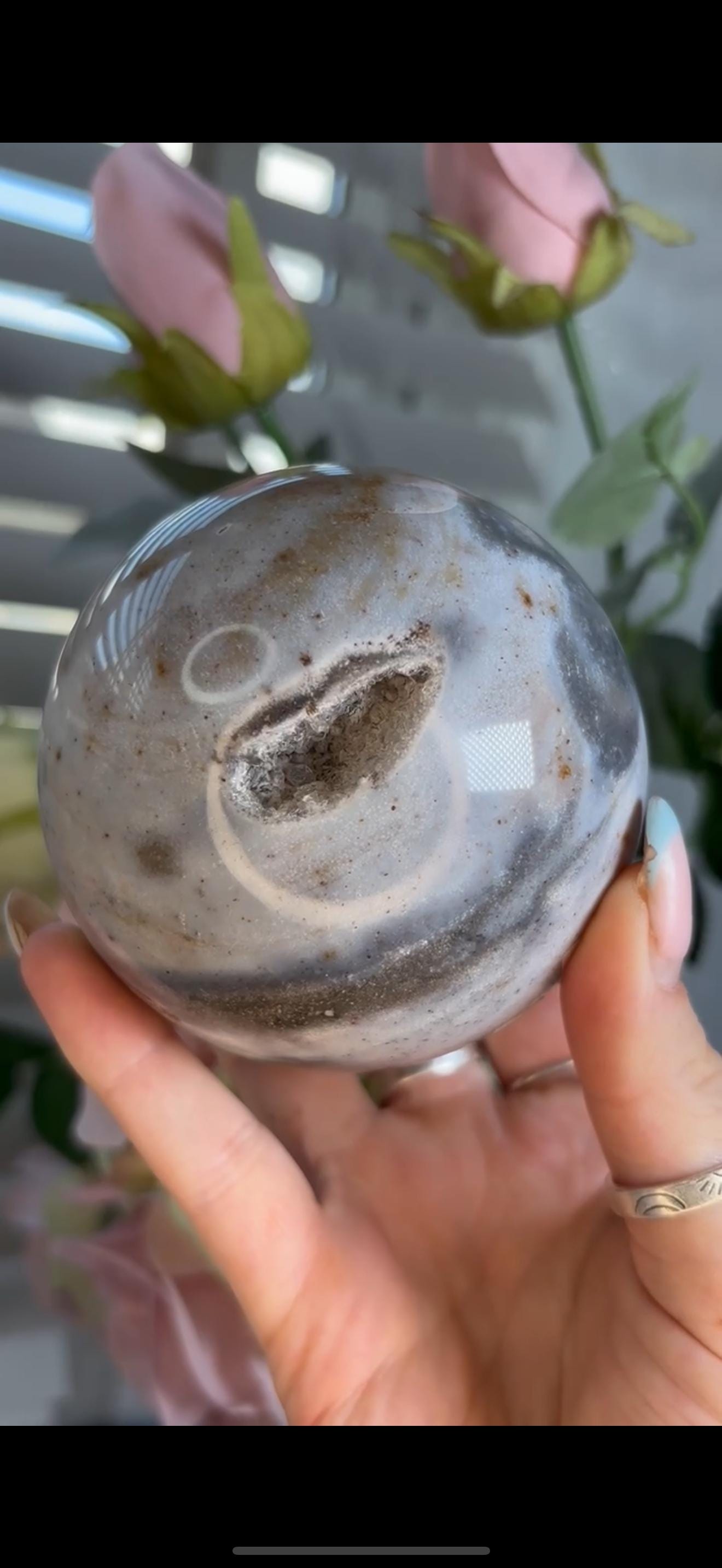 Pastel ocean jasper sphere in baby blue & grey tones with some druzy