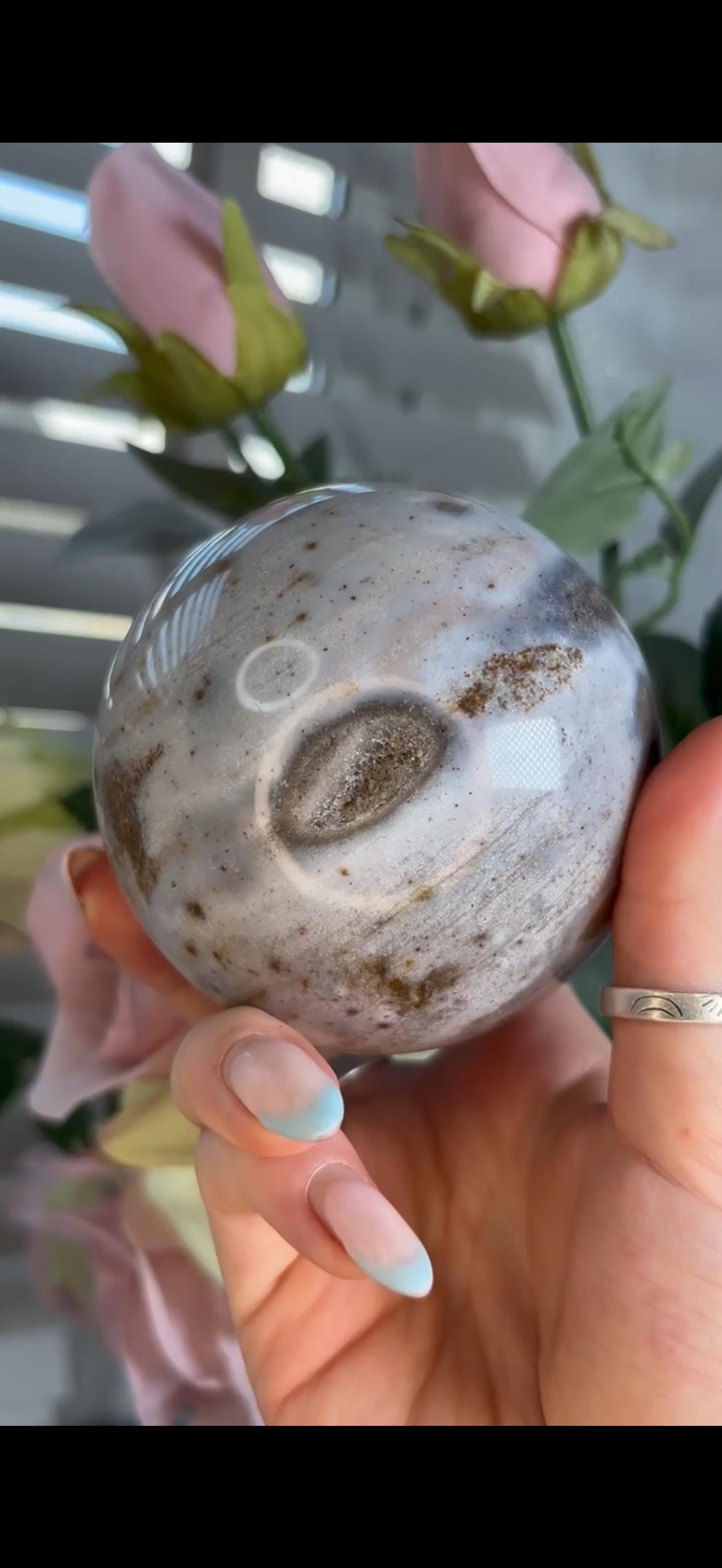 Pastel ocean jasper sphere in baby blue & grey tones with some druzy