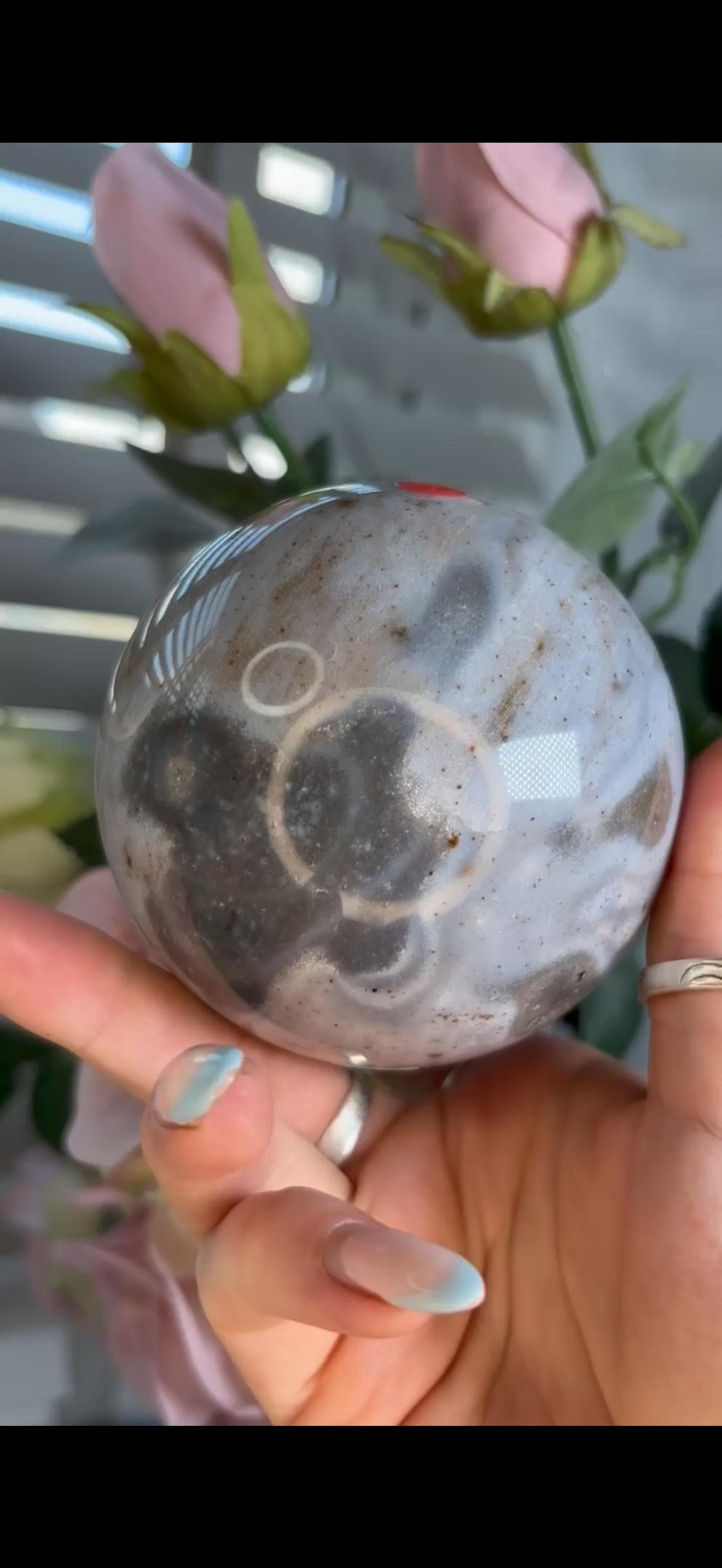 Pastel ocean jasper sphere in baby blue & grey tones with some druzy