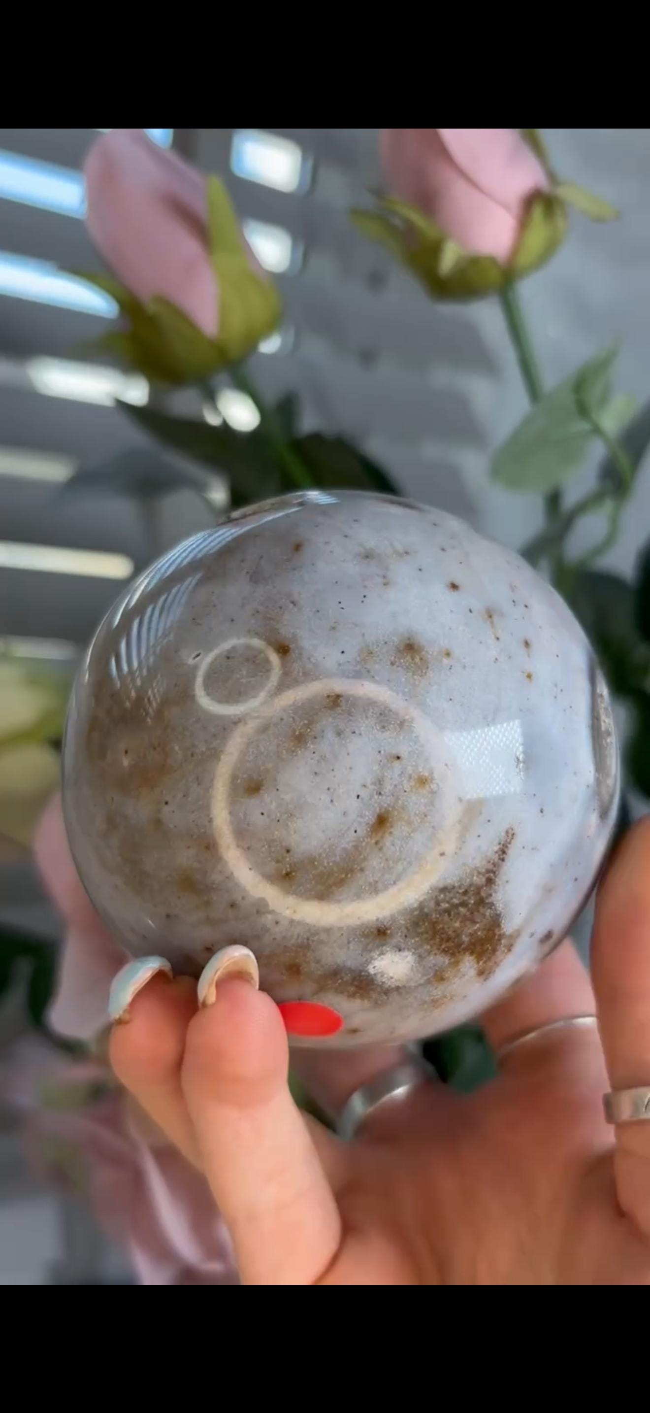 Pastel ocean jasper sphere in baby blue & grey tones with some druzy