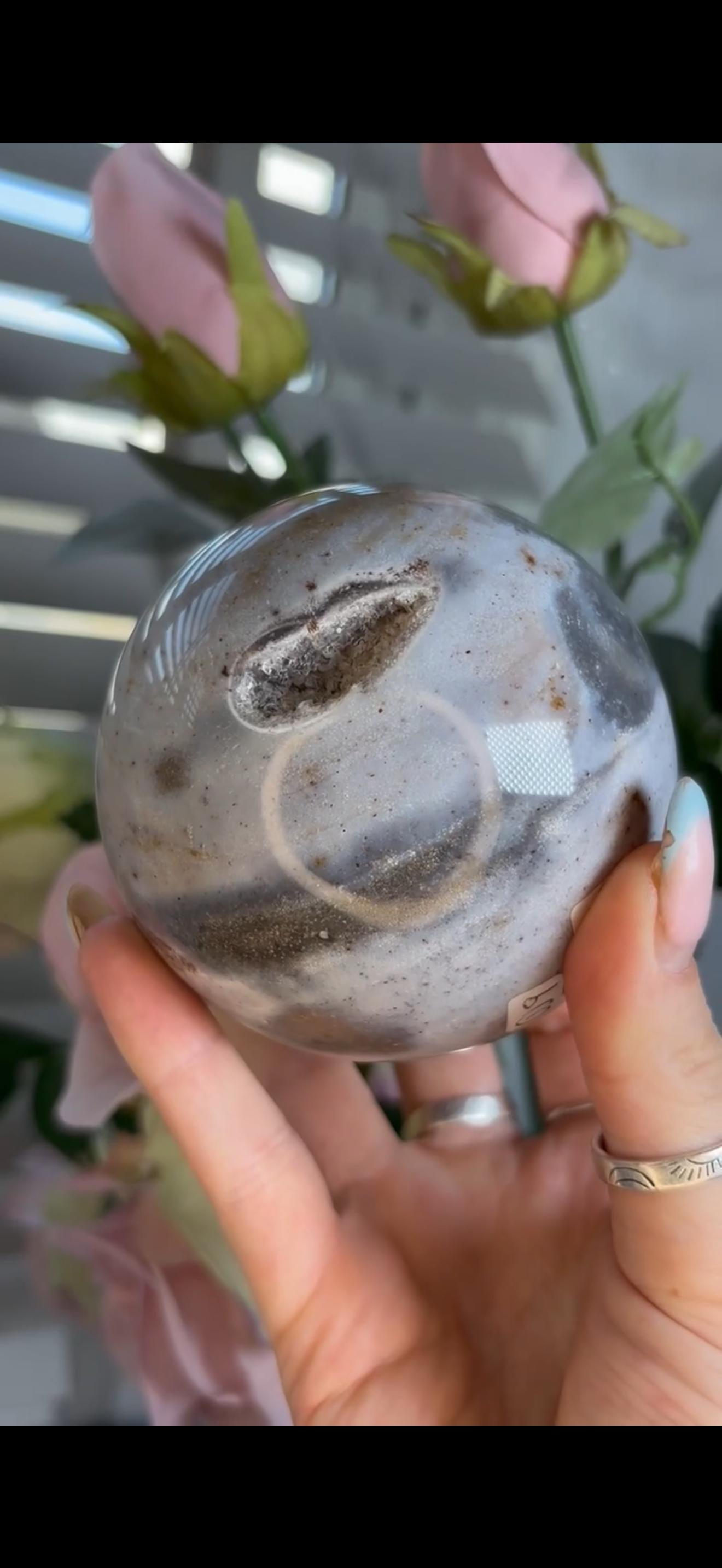 Pastel ocean jasper sphere in baby blue & grey tones with some druzy