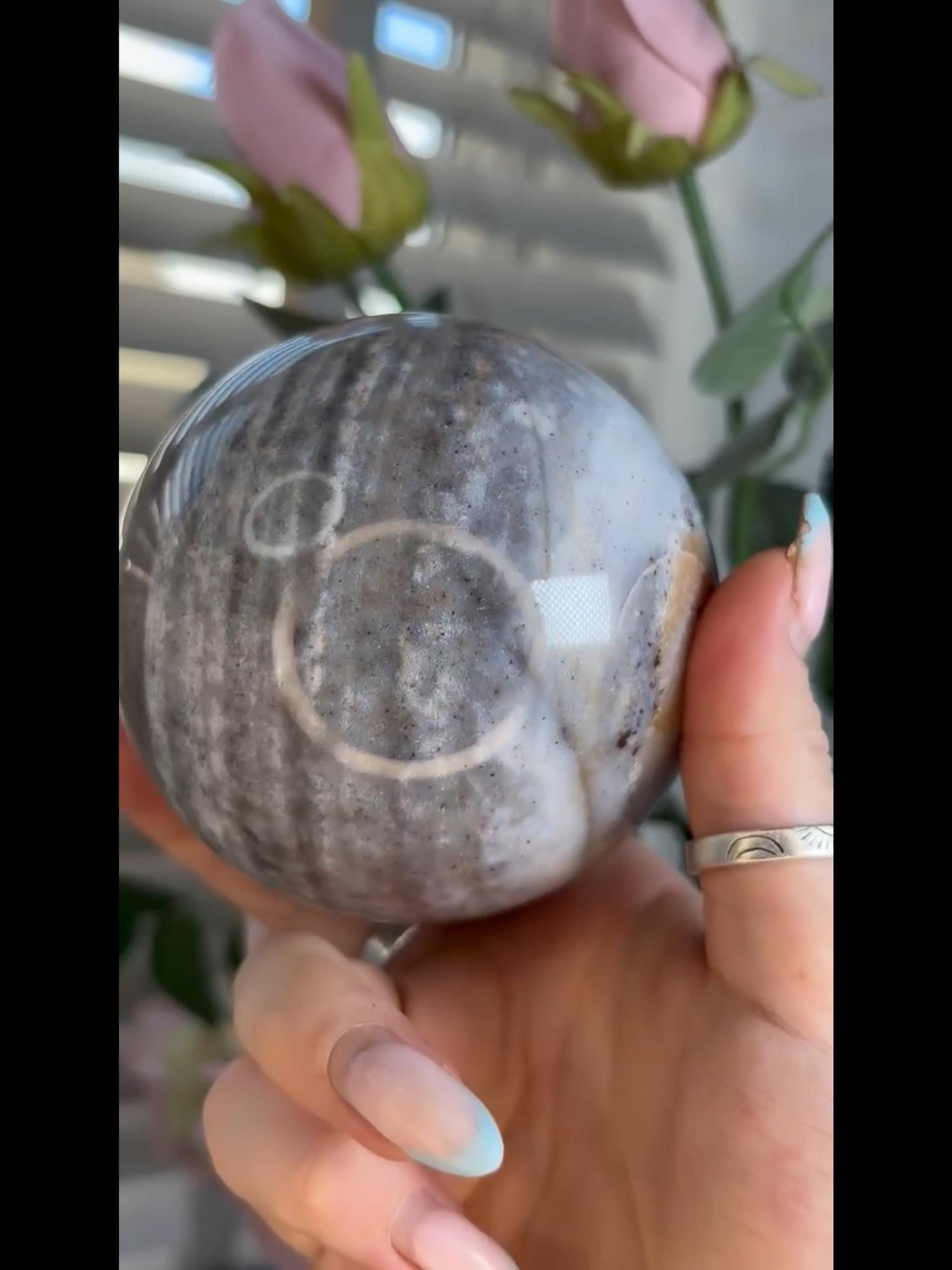 Pastel ocean jasper sphere in blue & grey tones with banding