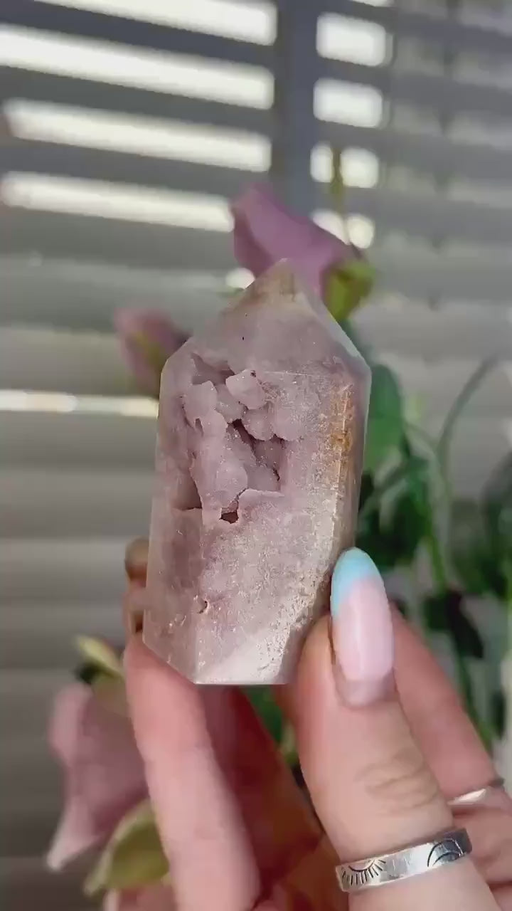 pink amethyst tower with bubble formation 128g 7cm by 4cm